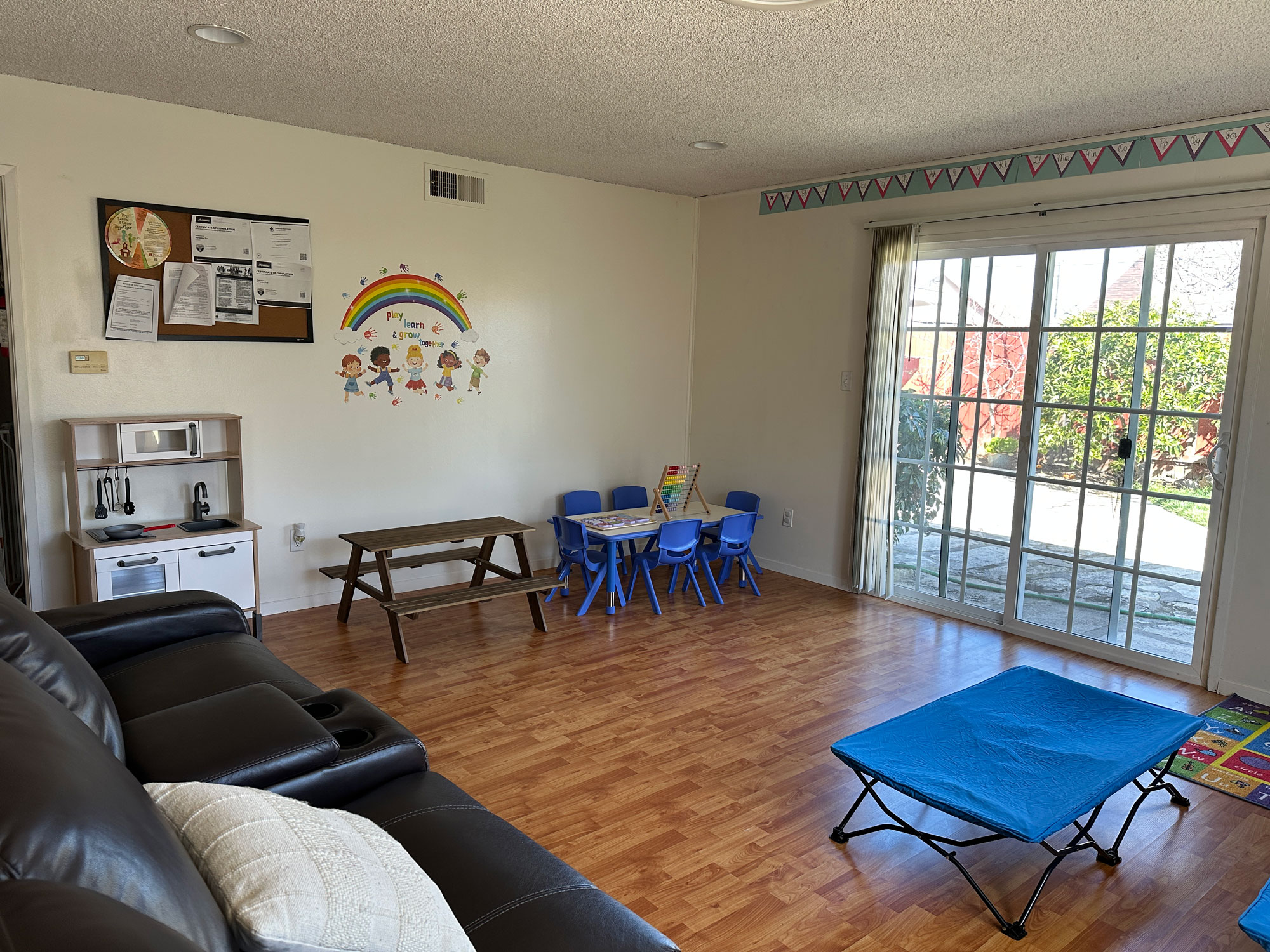 Indoor learning and play area with educational toys and child-sized furniture